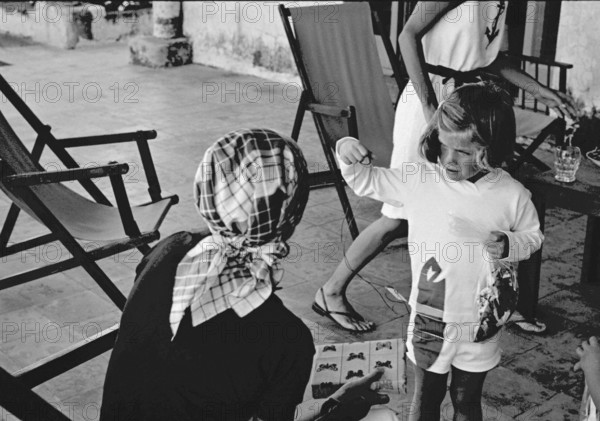 Jackie Kennedy. Summer 1962. Vacation in Ravello (Italy). Deckchair