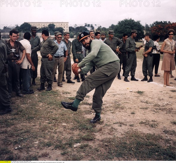 Fidel Castro is playing baseball