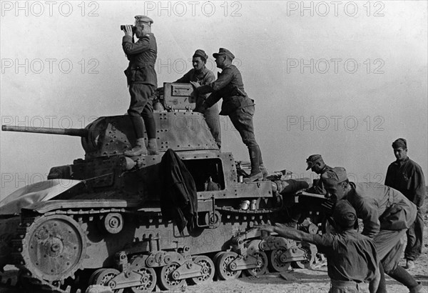 Rommel, Erwin 1891-1944
Officer, general field marshall, germany
commander of the german africa corps Feb.41-March 43 (WWII) 
Lt. gen. Rommel observing from top of an italian tank (carro armato M13/40) enemy troop movements at Sollum (british op.Brevity)