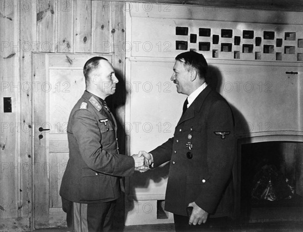 Erwin Rommel *1891-1944+ Officer, Field Marshal, germany : 
commander of the german africa corps Feb.41-March43
commander of army group B for italy and atlantic July43-July44
Adolf Hitler confers the decoration 'diamonds to the knight's cross' to Erwin Rom