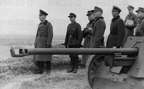 ERWIN ROMMEL (1891-1944). /nGerman Field Marshal. Rommel, commander of the German Afrika Korps, inspecting the German position at the Atlantic Wall near Fecamp, Normandy, France. Photographed 17 January 1944.