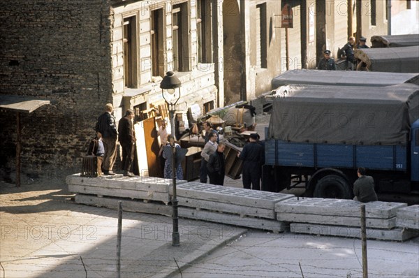 Germany / GDR, Berlin. The building of the wall. Eviction of houses at Bernauer Strasse. August 1961