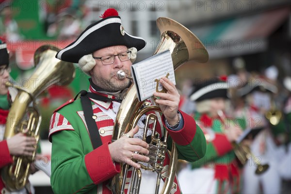 Musician with tuba in uniform