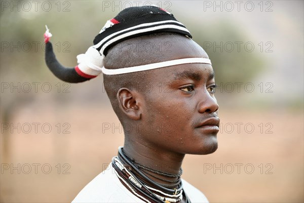 Young Himba man with traditional hairstyle