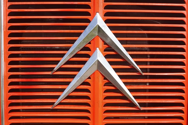 Citroen logo on red radiator grille