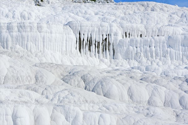 White travertine limestone rock formations known as the cotton castle