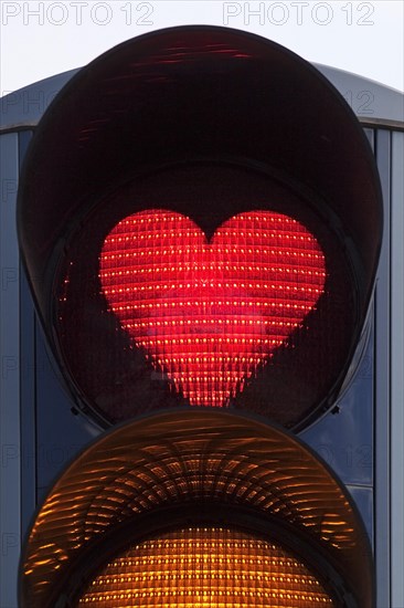 Traffic light with red heart