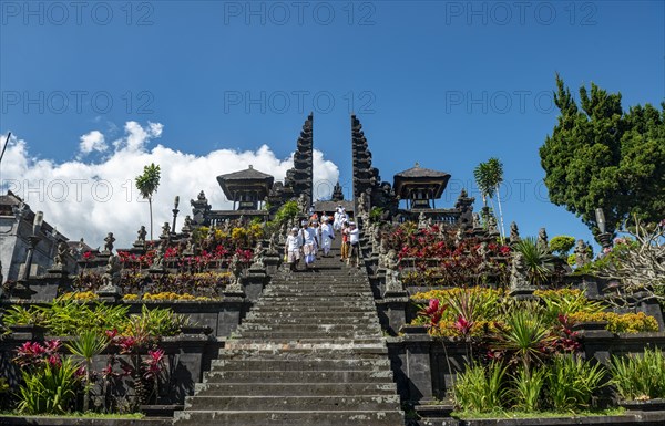 Devout Balinese descend stairs