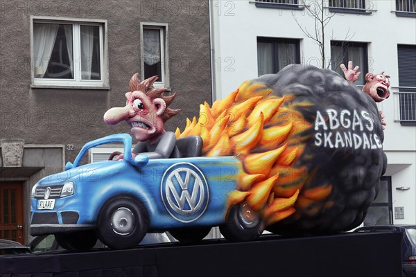 Burning VW car with monkey in exhaust gas cloud