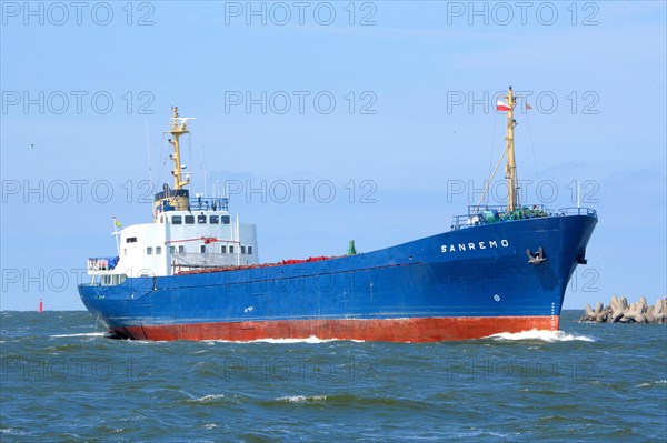 Cargo ship coming in to the harbor in Swinoujscie