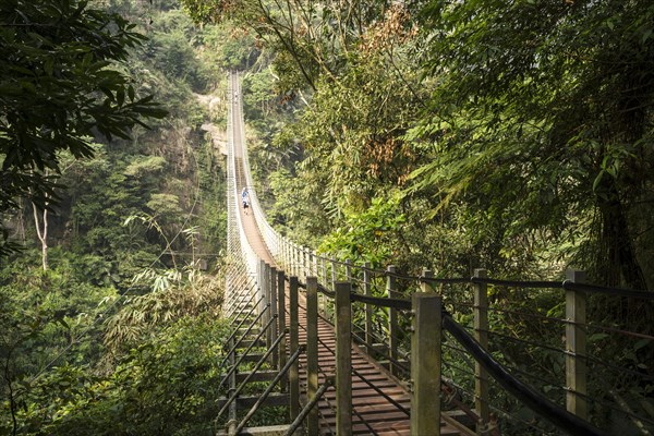 People on suspension bridge