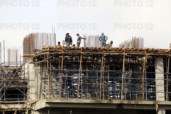 Wooden scaffolding on building shell