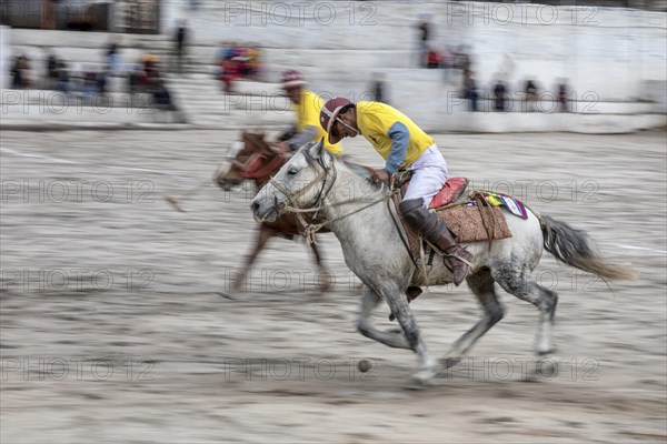 Men taking part in a polo match in Leh