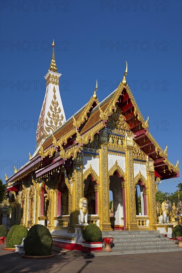 Bot in front of the Chedi of Wat Phra That Phanom