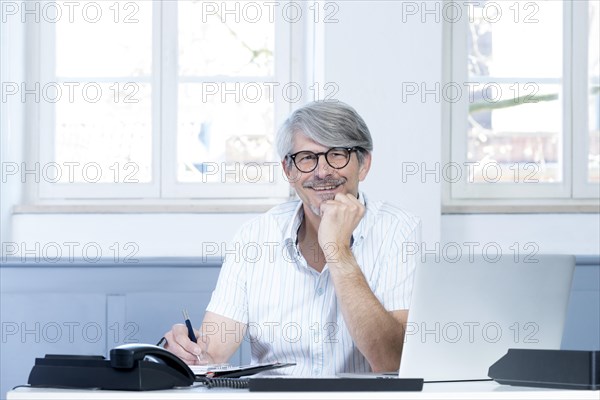 Man working at the laptop in the office