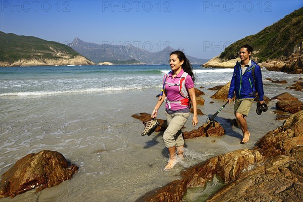 Hikers on Sai Wan Beach