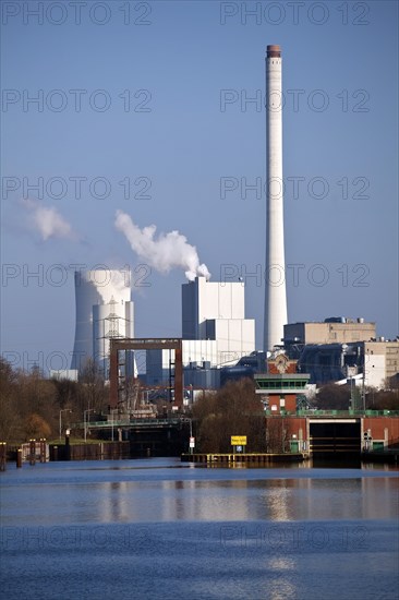 Rhine-Herne Canal near Wanne-Eickel lock with coal-fired power plant in Baukau