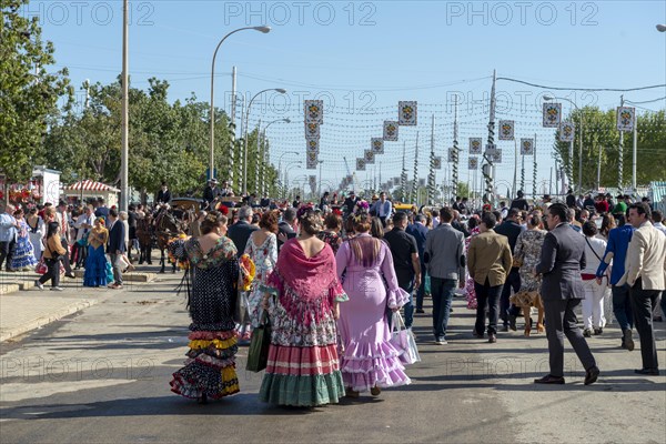 Spanish women in traditional flamenco dresses