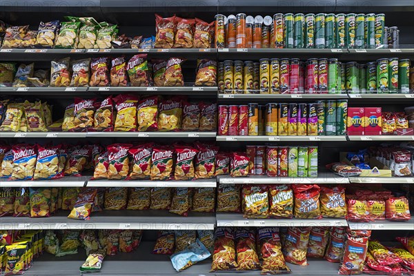 Snacks in a supermarket shelf