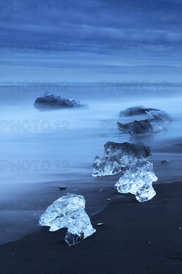 Pieces of ice on the beach
