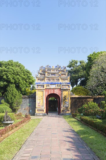 The decorative yellow gate leading to the Mieu temple inside the imperial citadel