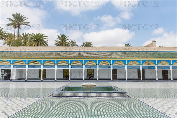 Ornate courtyard with columns and fountain