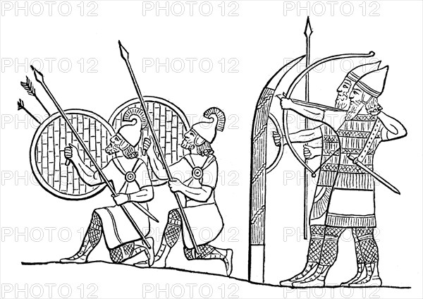 Assyrian phalanx infront of the walls of a besieged city