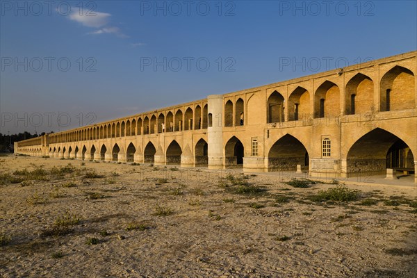 Si-o-Seh Pol or Si-o-Seh Bridge on the dried Zayandeh River