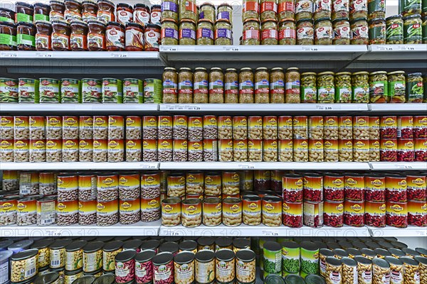 Canned vegetables on a shelf in a Turkish supermarket