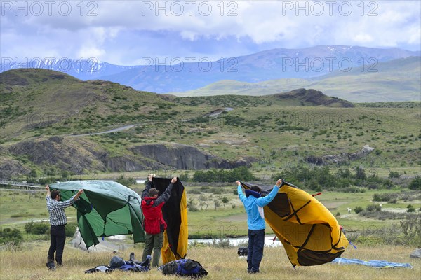 Tourists drying their tent
