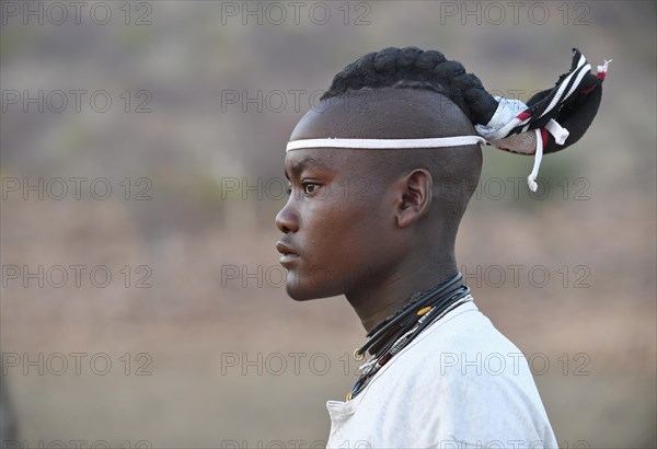 Young Himba man with traditional hairstyle