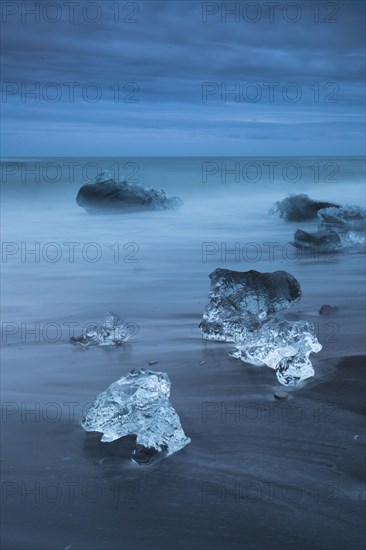 Pieces of ice on the beach