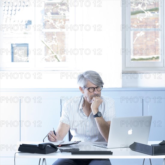 Man working at the laptop in the office