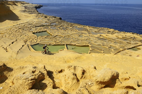 Mountain biking near Gozo salt pans