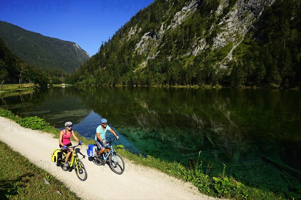 Cyclists on the Mozart Cycle Path at Lake Lodensee