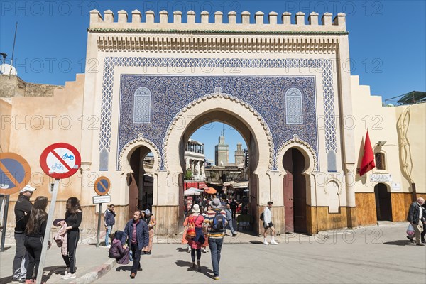 Locals and tourists in front of Bab Boujeloud