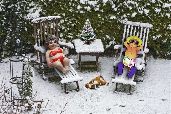 Garden chairs in snow