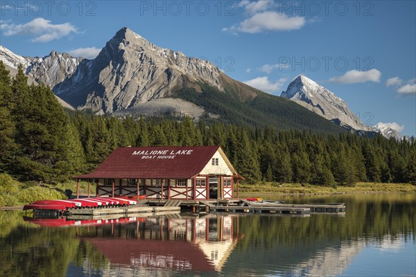 Boathouse with canoes on the shores of Maligne Lake