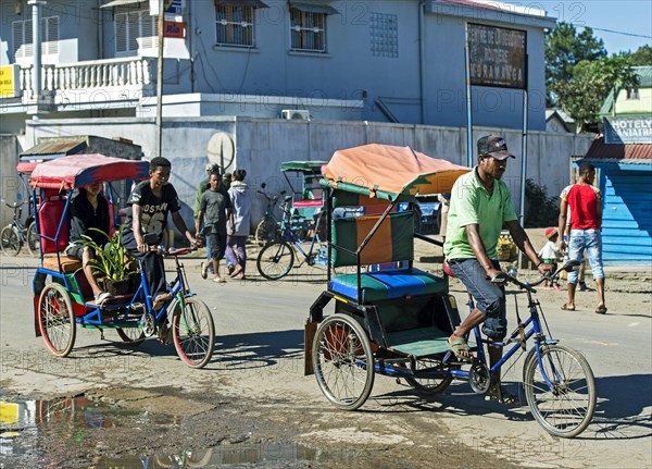 Rickshaw driver on road