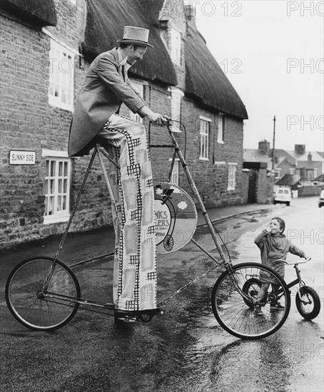 Man on curious big bike