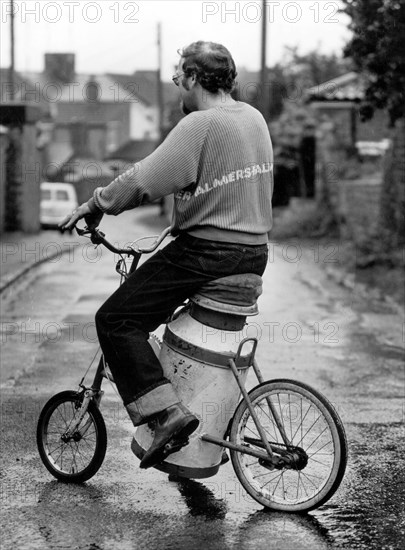 Man on a curious bicycle