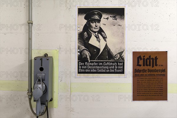 Bunker telephone and poster of Goring from a civil air-raid shelter in World War II