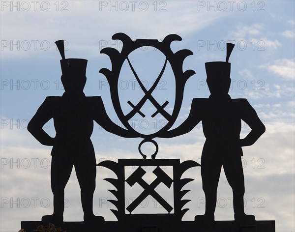 Guild symbol of miners with hammer and sword