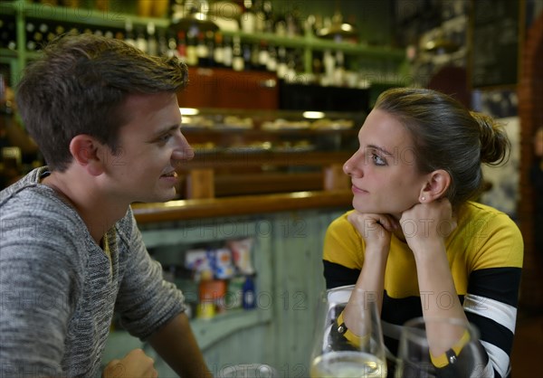 Young couple talking in Tapas Bar