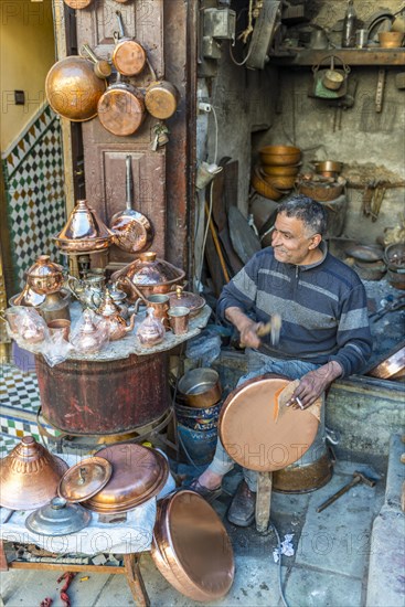 Coppersmith at work