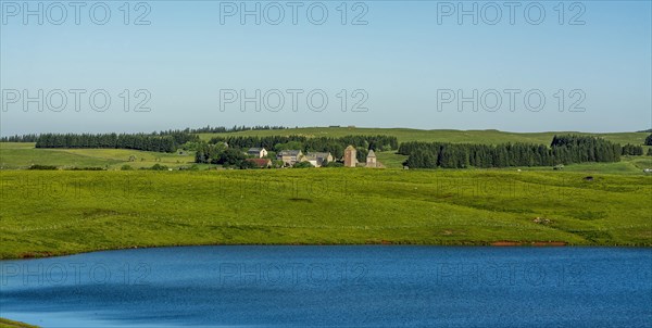 View on Aubrac village and lake months