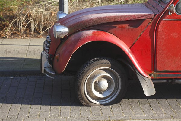 Flat tire on vintage car