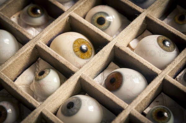 Artificial glass eyes in a box