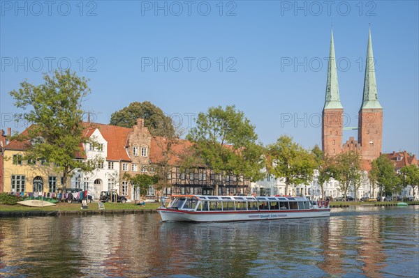 Historical townscape on the river Trave with cathedral