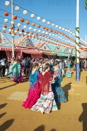 Spanish women wearing flamenco dresses